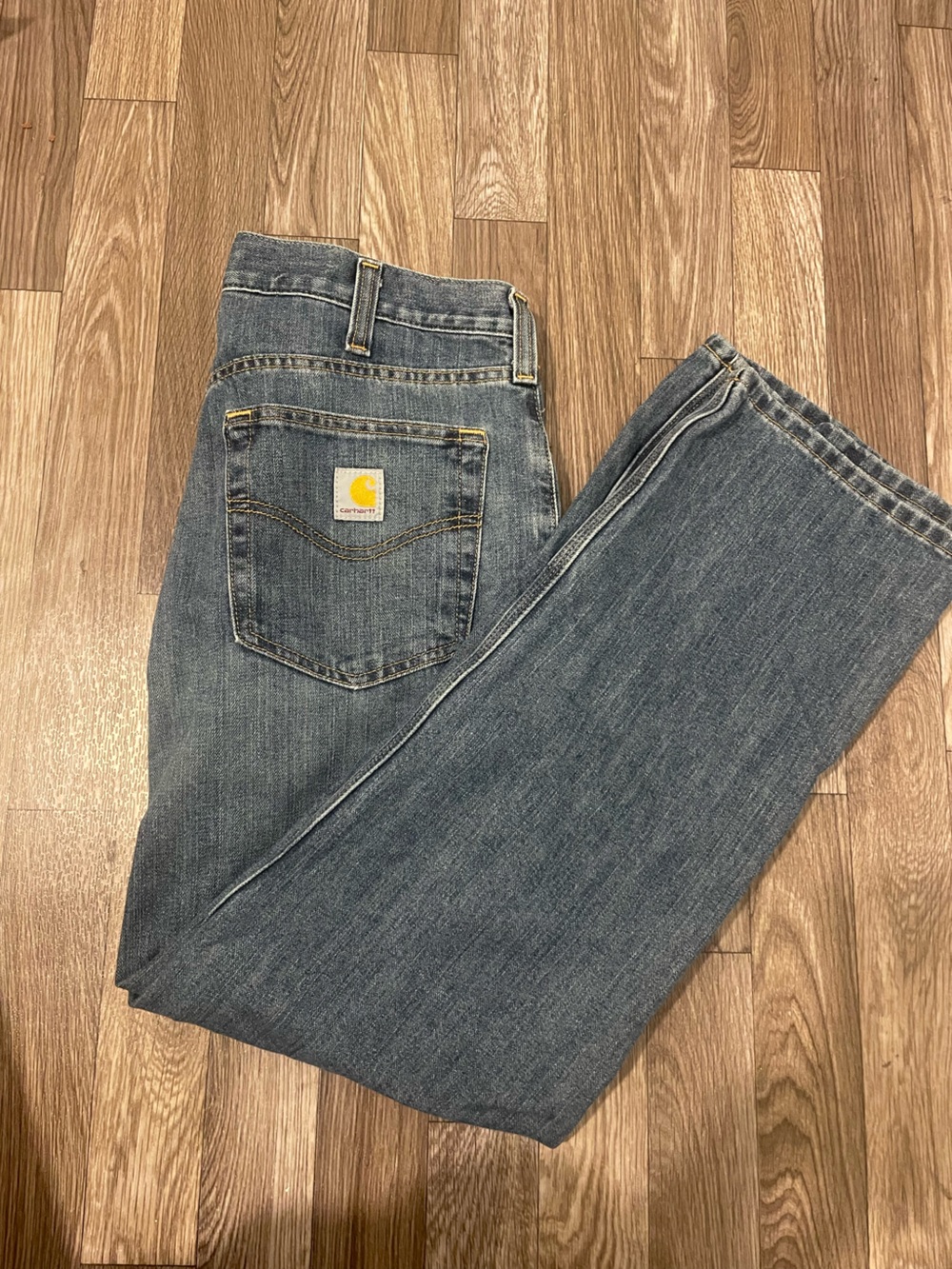Carhartt Men's Faded Blue Straight Jeans with Patch Logo